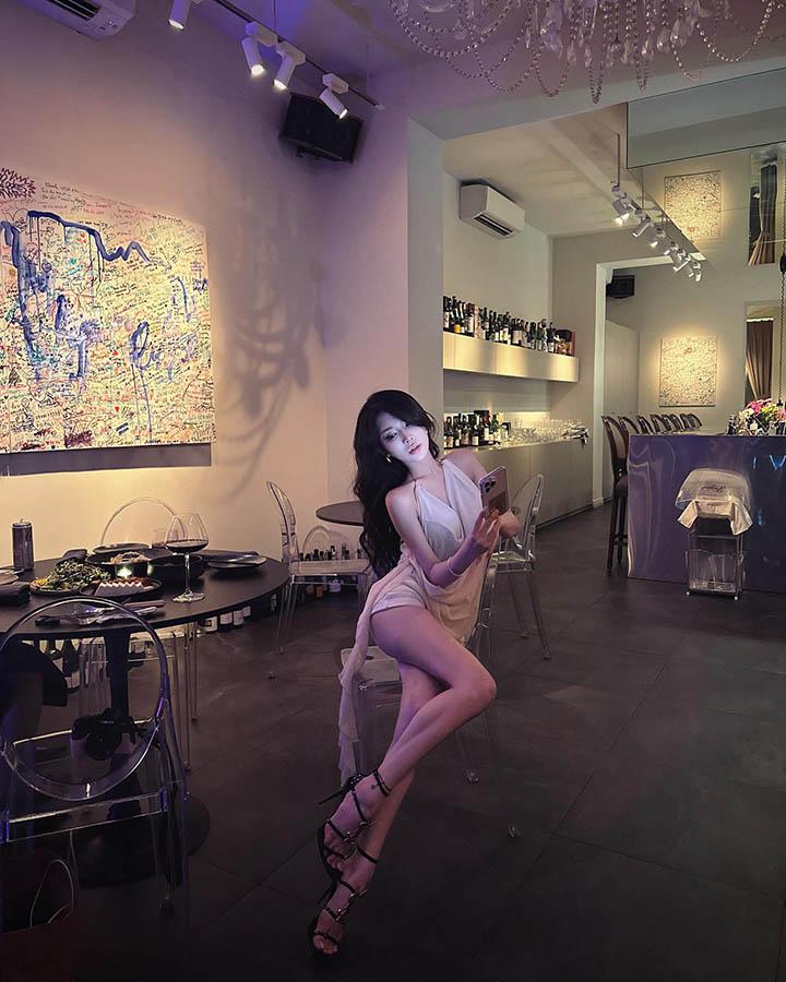 Nguyen Quynh Anh in a fitted crop top and skirt