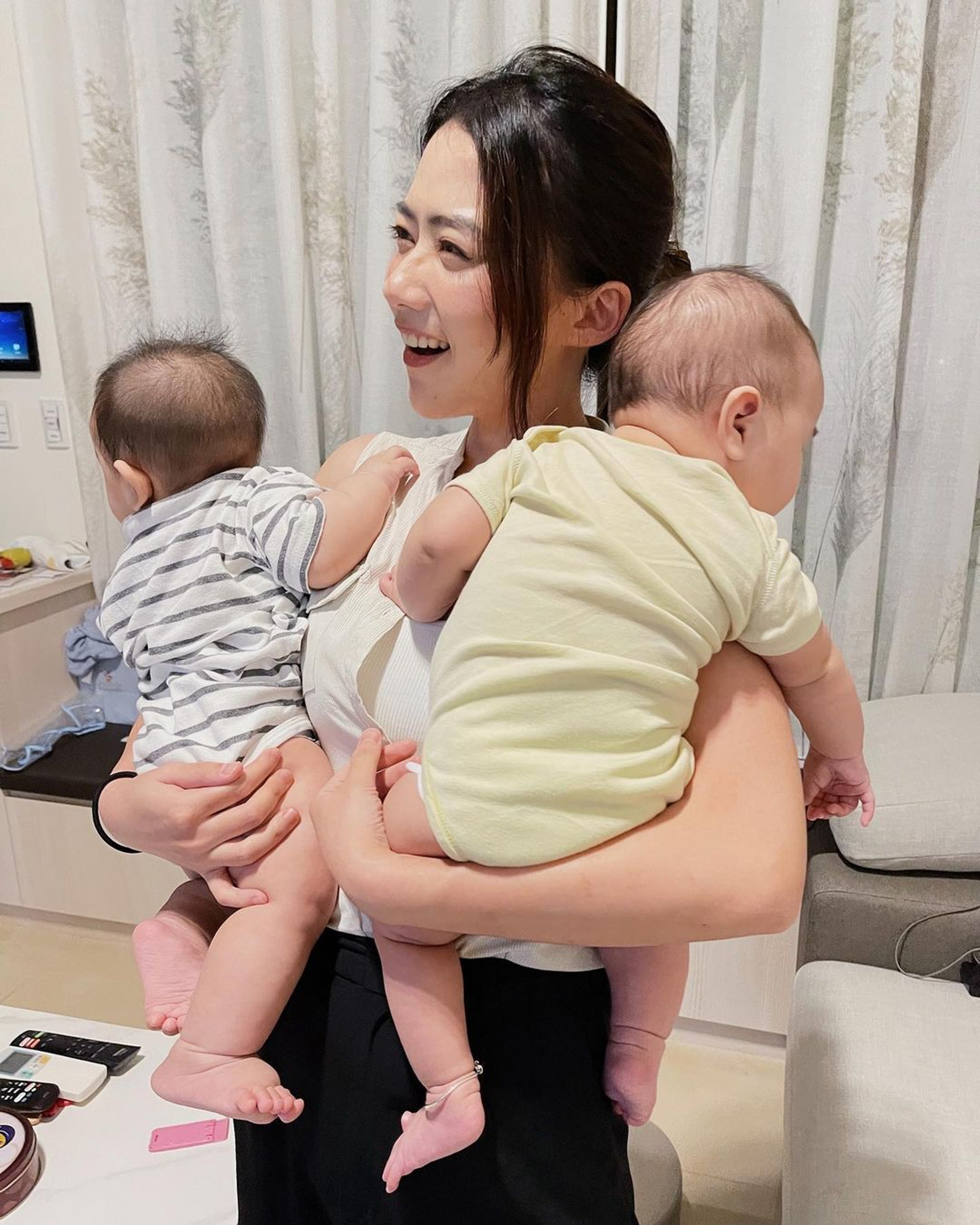 Ah Chu holding her niece