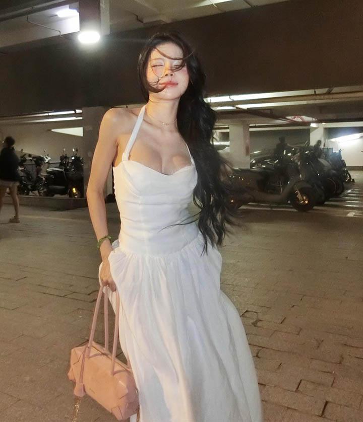 Mai Dora Shares Stunning Photos with a Fan-Favorite Name 5 Mai Dora with flowing black hair and mysterious gaze