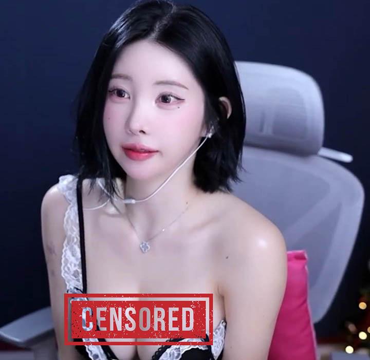 Kim Woo-yu posing in a sexy outfit