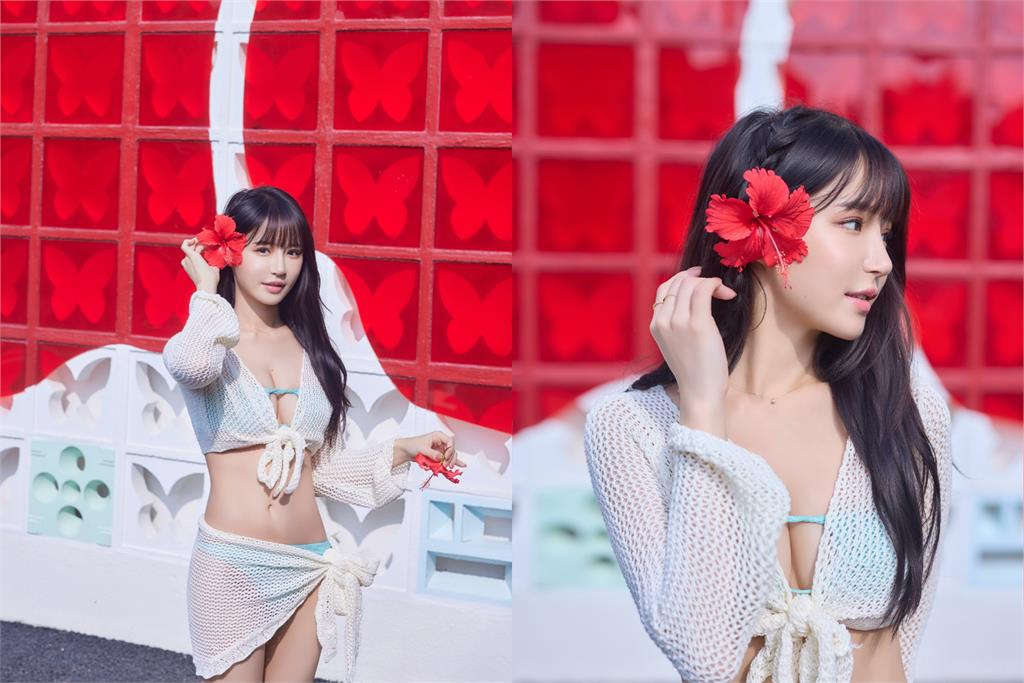 Yuan Yuan smiling brightly at the beach