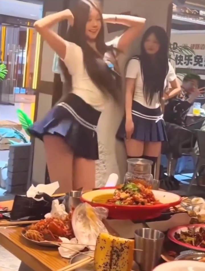 Dancers performing at hotpot restaurant