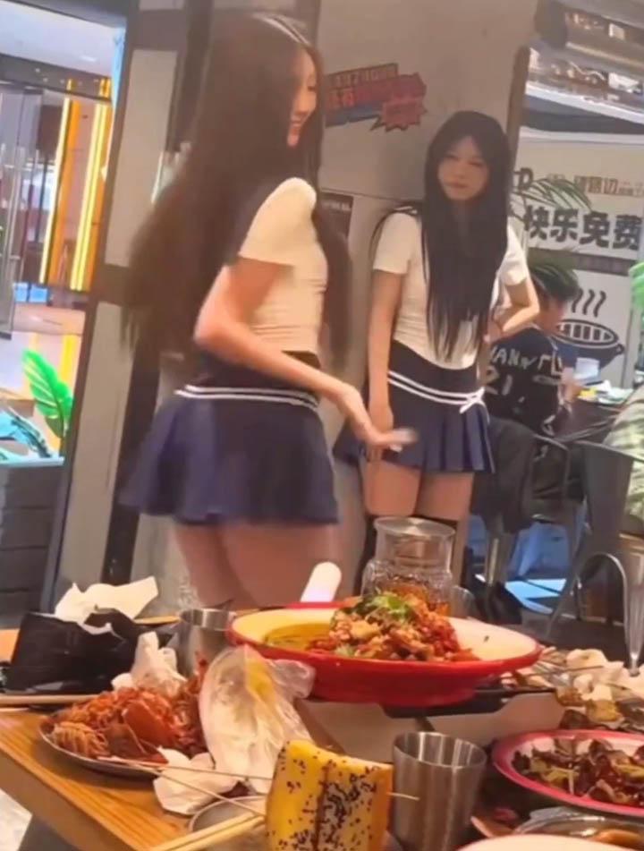 Professional dancers hired by hotpot restaurants