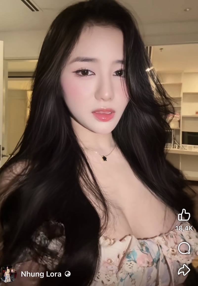 Nhung Lora posing with soft expression