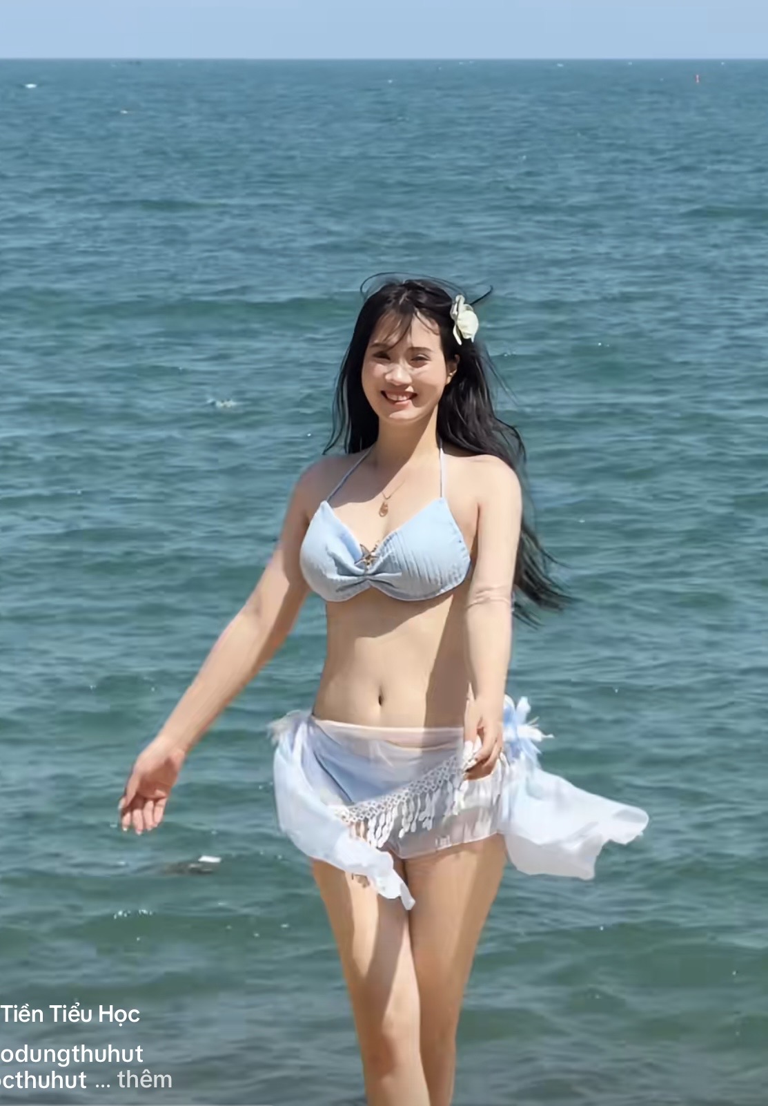 Kindergarten Teacher Stuns with Beach Glow and Perfect Figure 1 Kindergarten teacher glowing on the beach