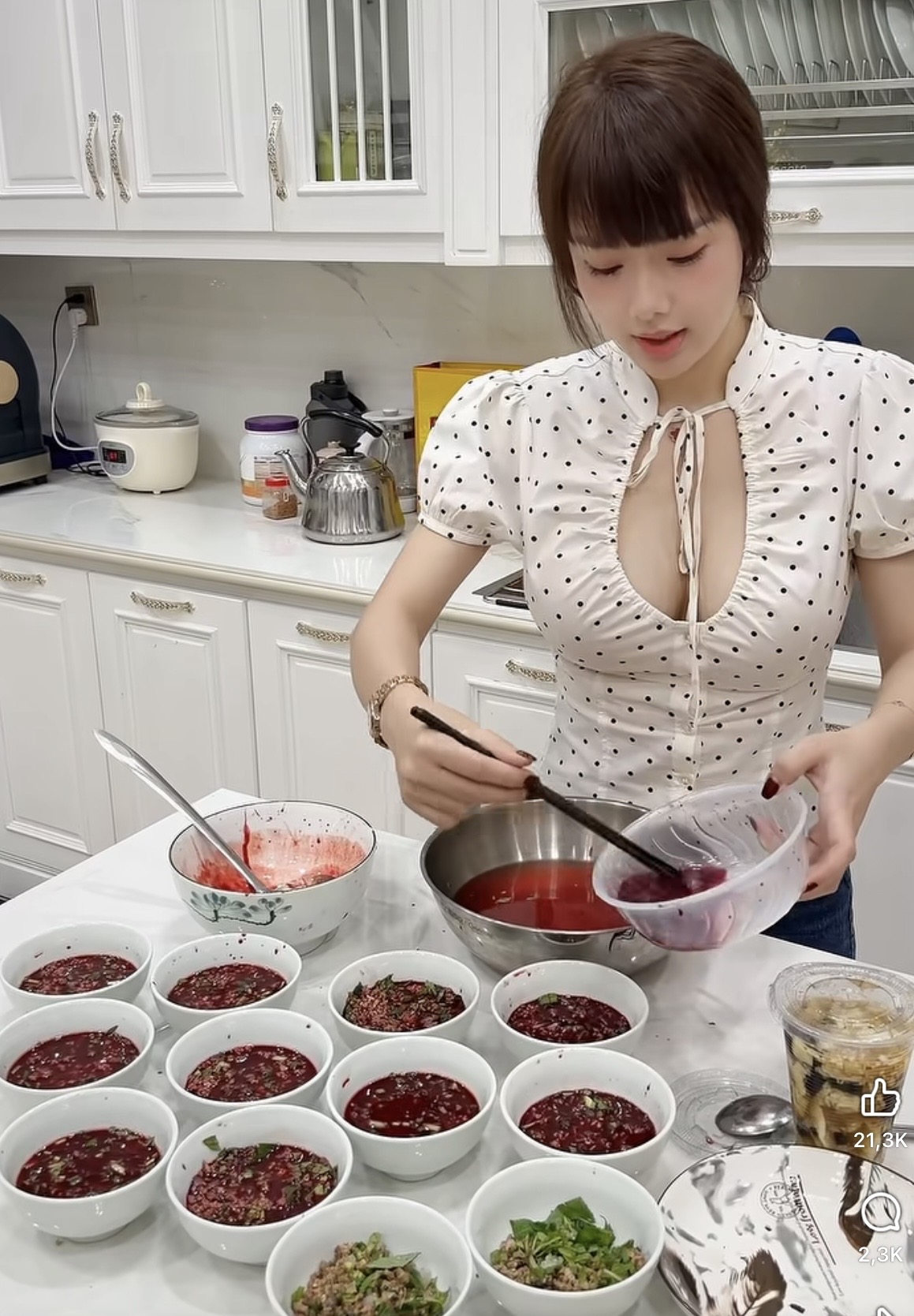Teacher Huong Wows Fans with Impressive Cooking Skills 2 Teacher Huong expertly preparing traditional dish