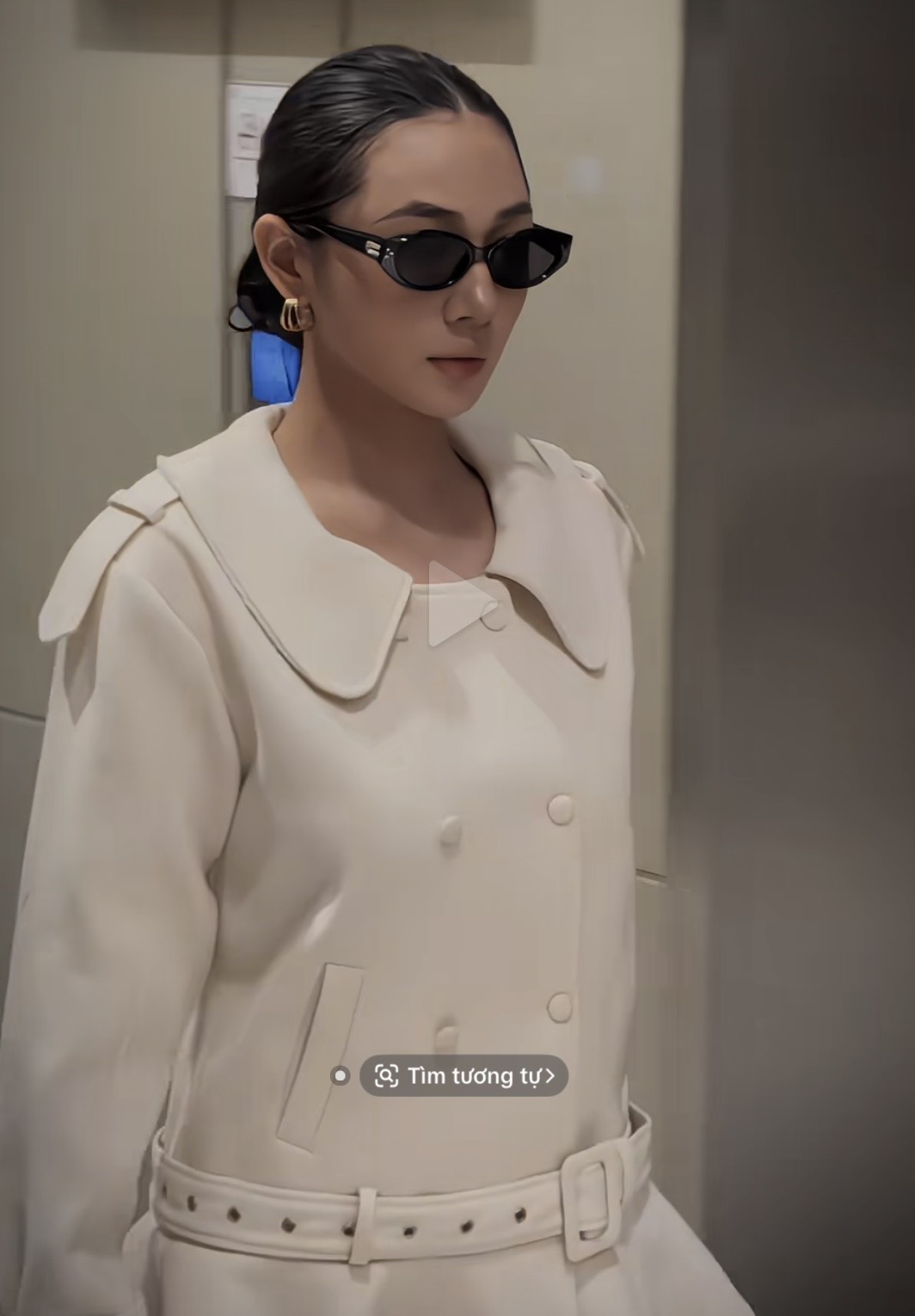 Trần Hà Linh wearing neutral-toned jacket
