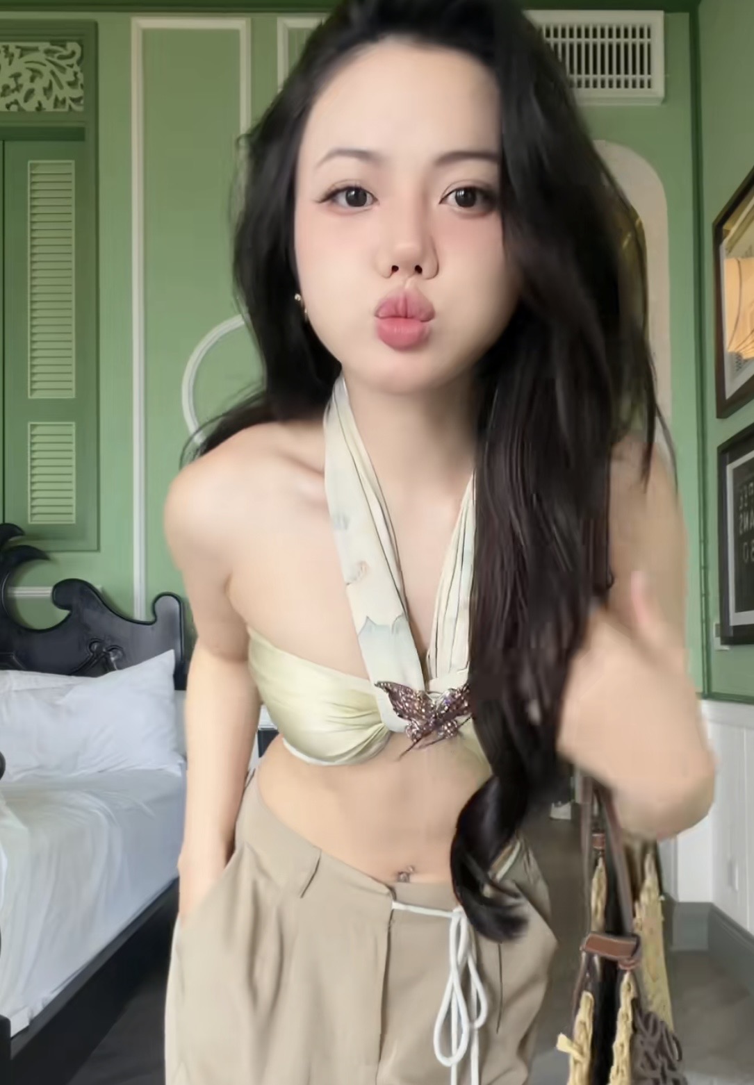 Ý Nhi posing in Audition-inspired outfit