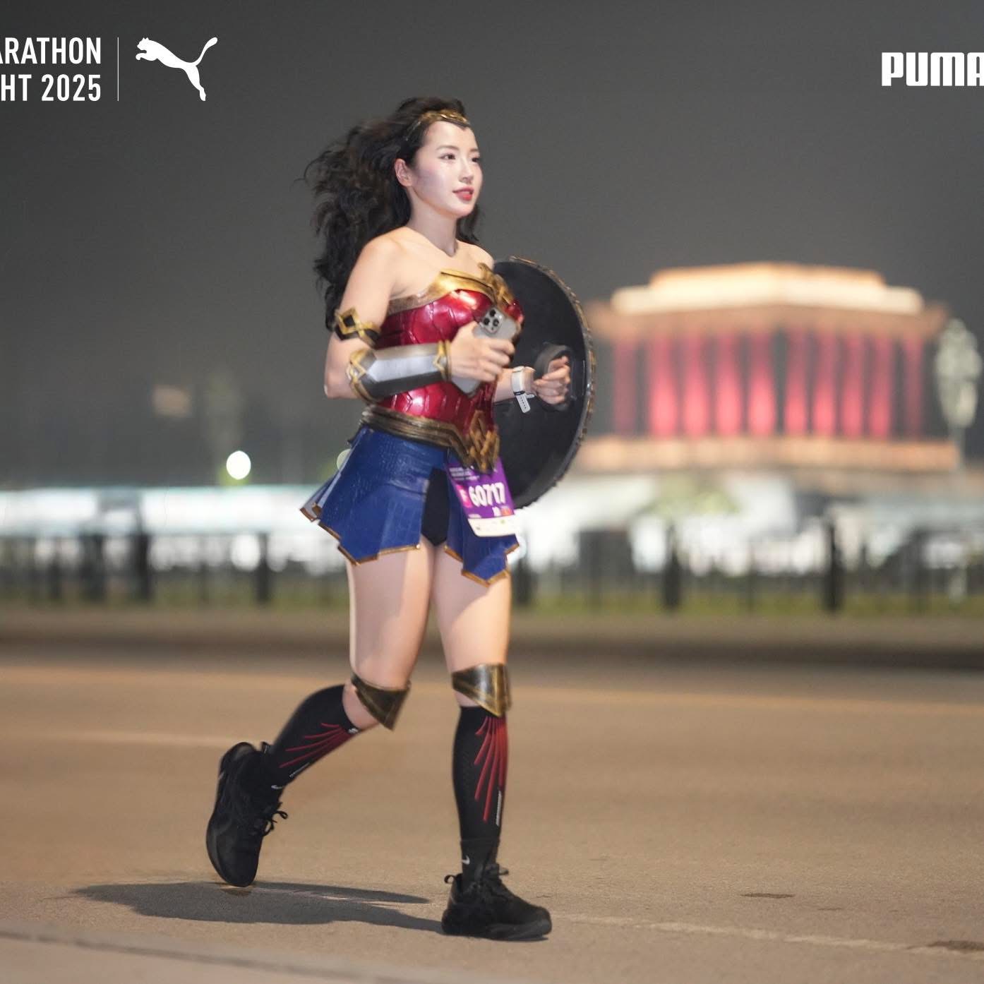 Loan Barbie in Wonder Woman costume at marathon