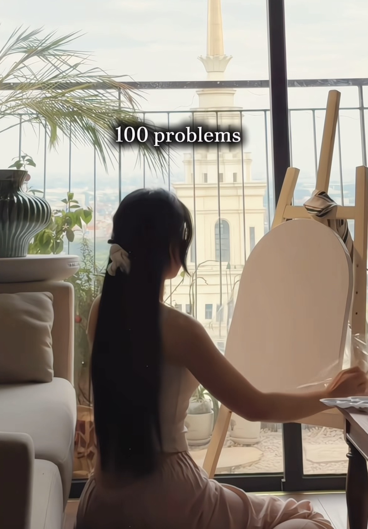 Le Bong painting at an easel