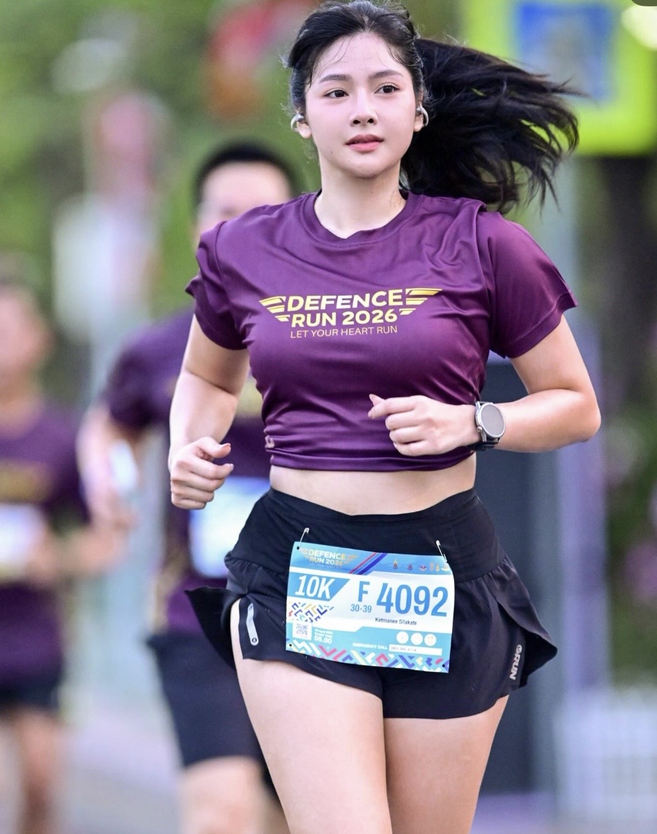 Meet Nahmfah: The Stunning Runner With a Hardcore Training Routine 1 Nahmfah running in sportswear