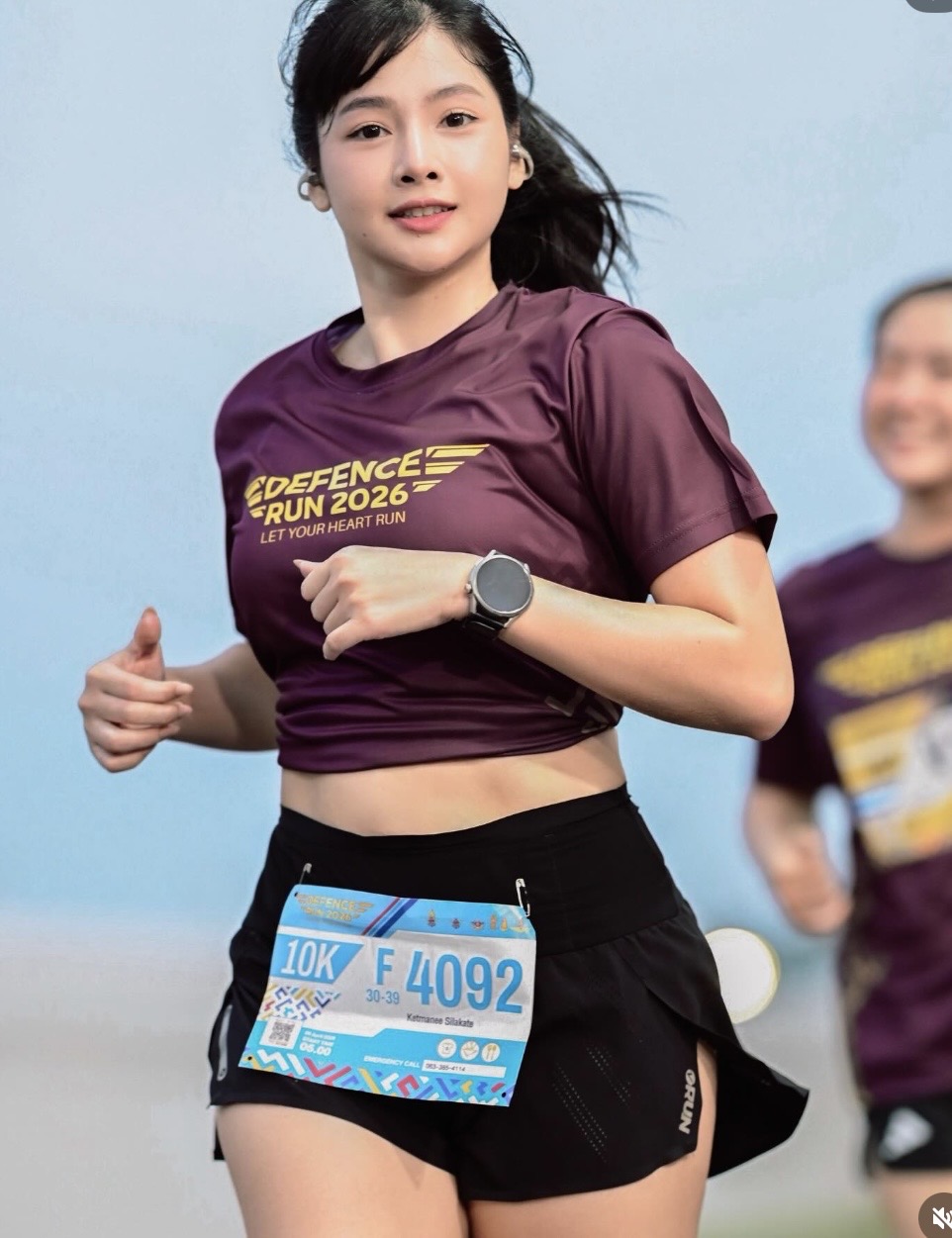 Meet Nahmfah: The Stunning Runner With a Hardcore Training Routine 3 Nahmfah running in tight sportswear