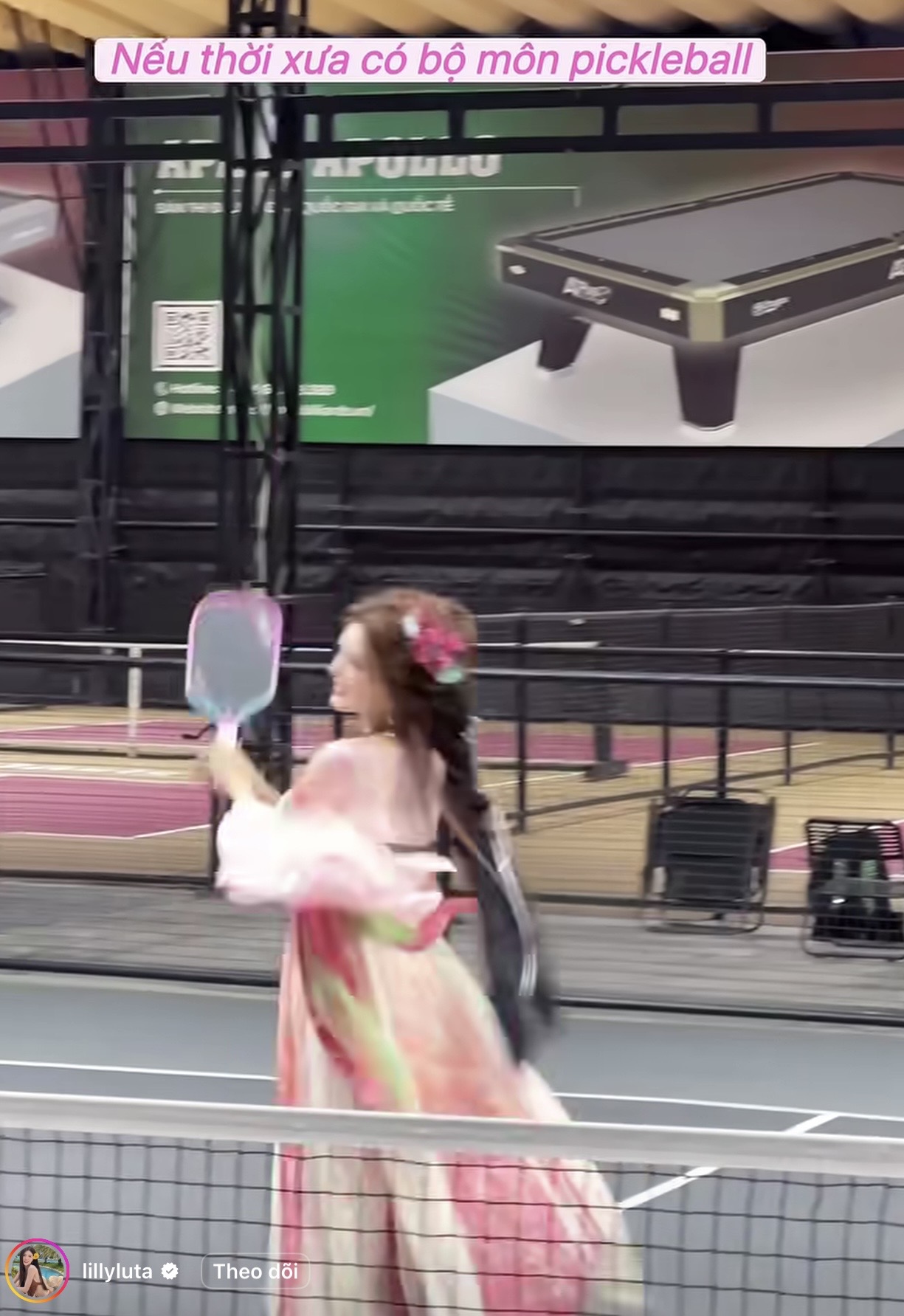 Lilly Luta playing Pickleball in traditional outfit