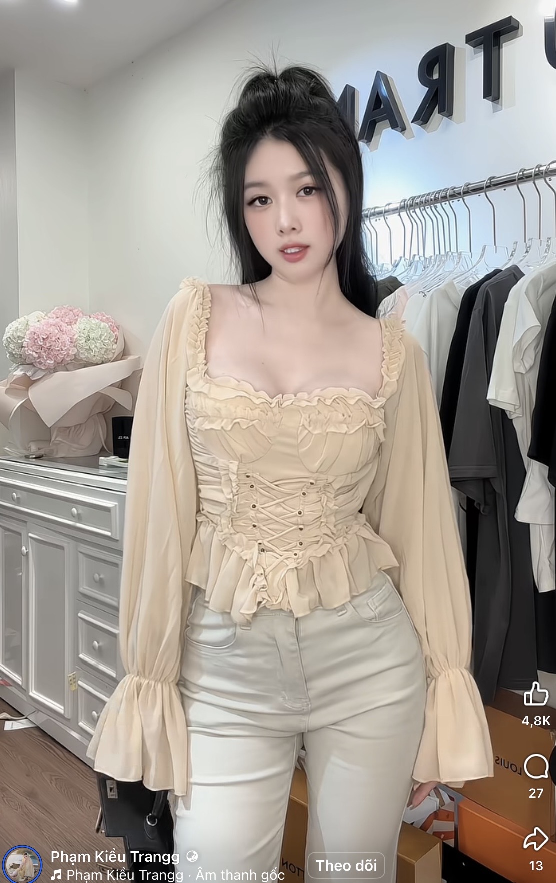 Pham Kieu Trang modeling her online shop's clothing