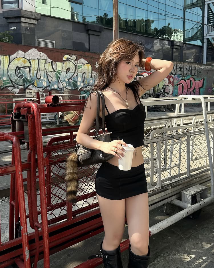 Model posing under harsh sunlight