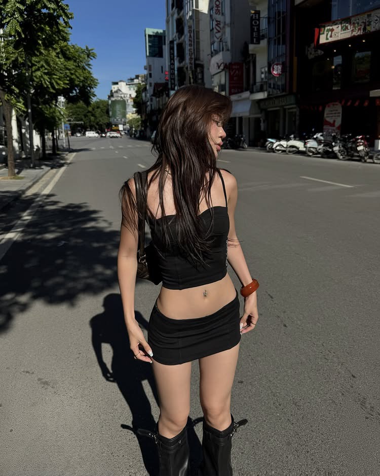 Girl posing in the hot Hanoi sun