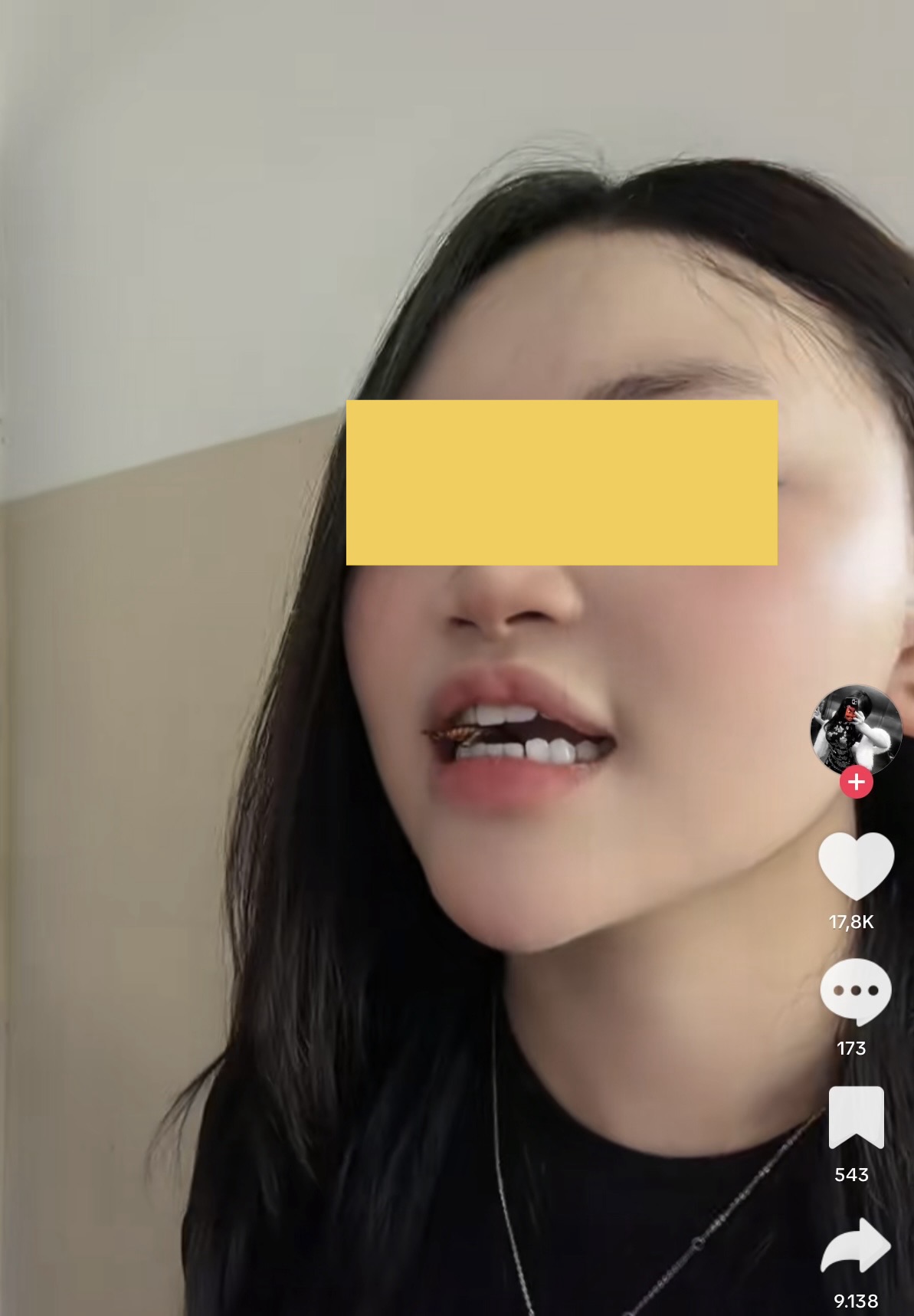 TikTok trending page showing cockroach eating video