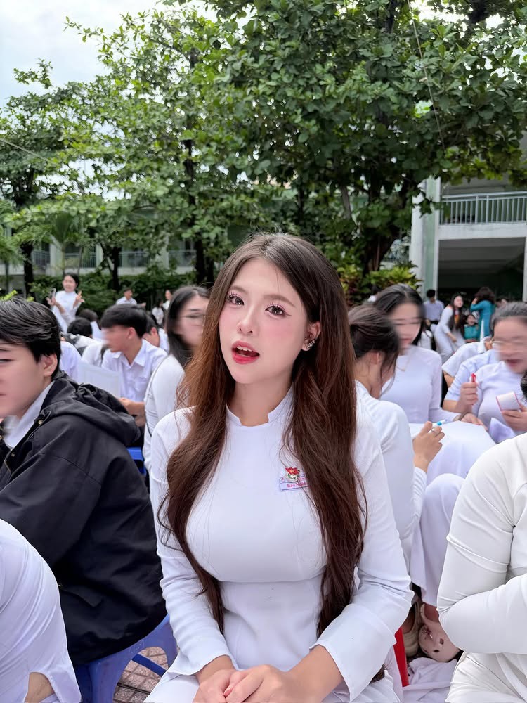 Elegant white ao dai showing soft curves