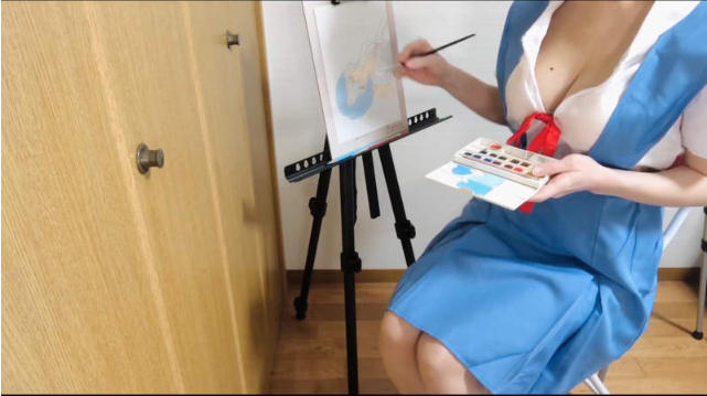 Close-up of cosplay outfit matching anime drawing