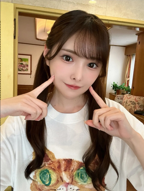 Arina Arai smiling in a casual look