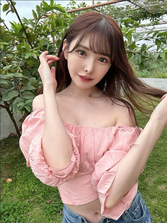 Arina Arai looking away thoughtfully