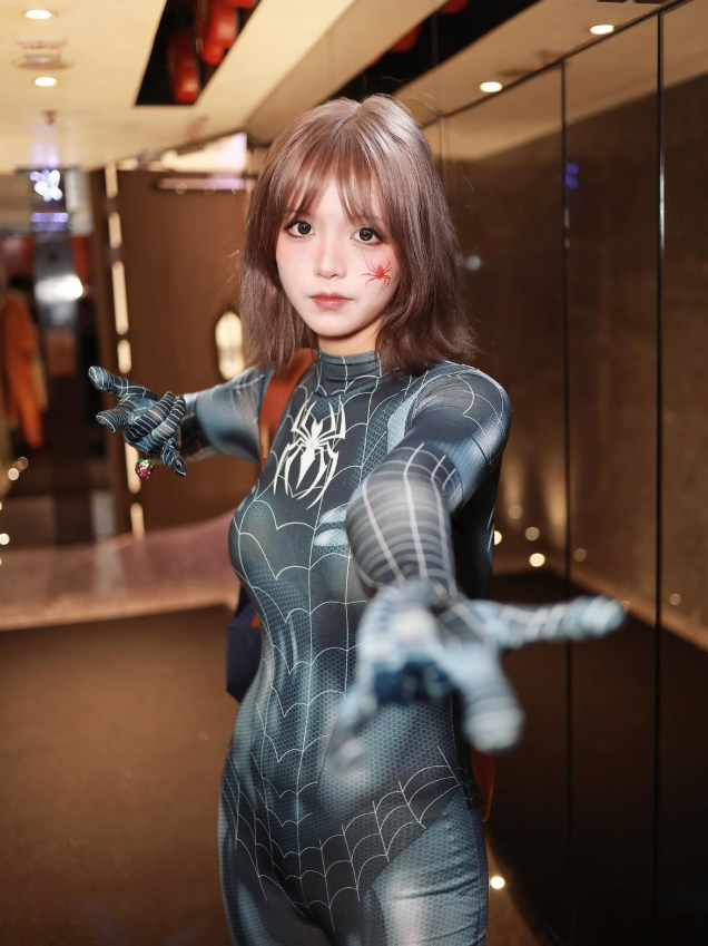 Close-up of hot girl in Spider-Woman cosplay
