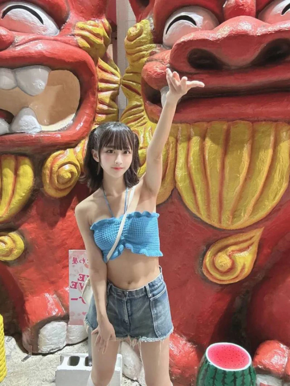 Himeya Yuzu walking on Okinawa street in light outfit