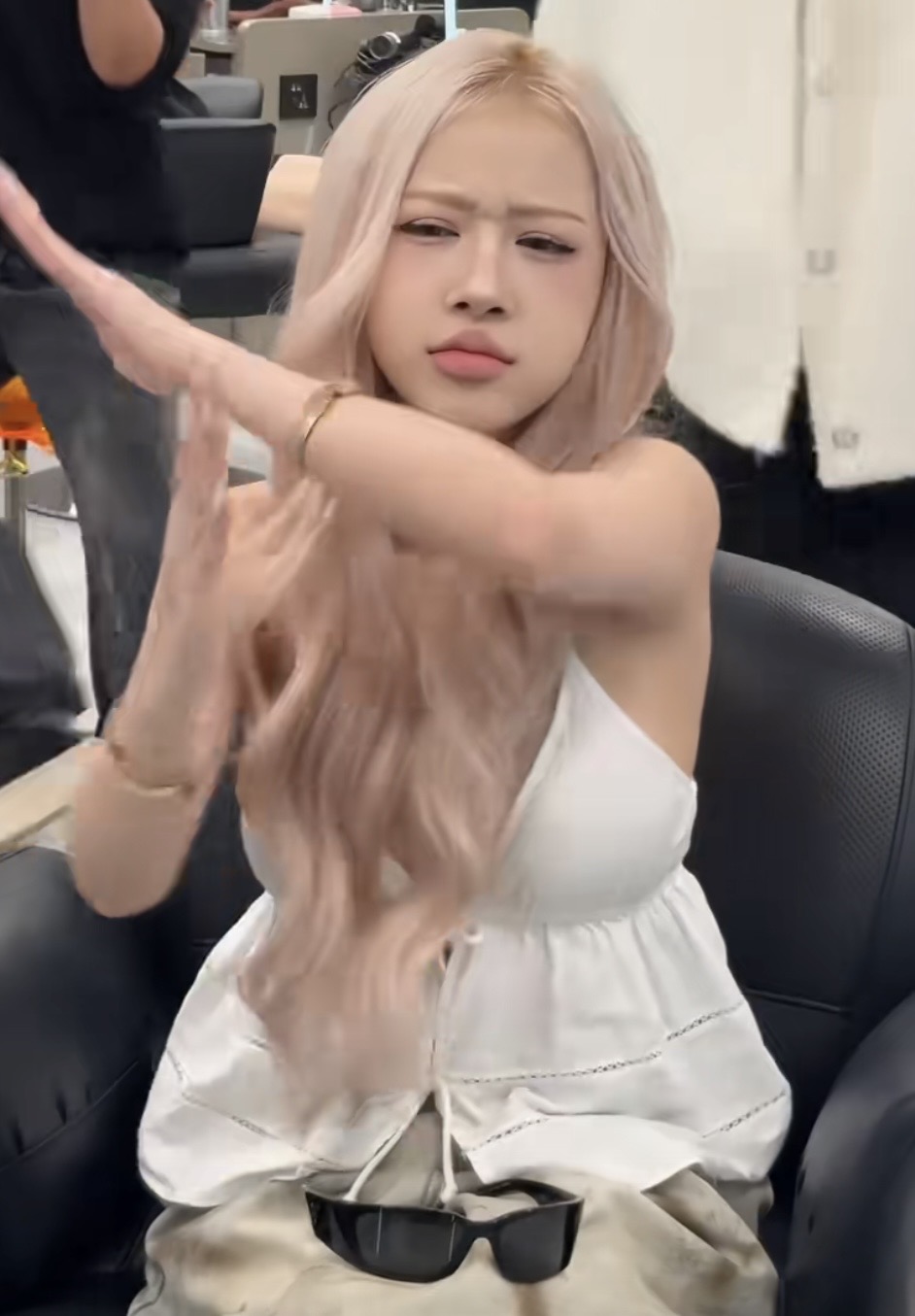 Lê Huyền Diệu with platinum blonde hair styled half-up