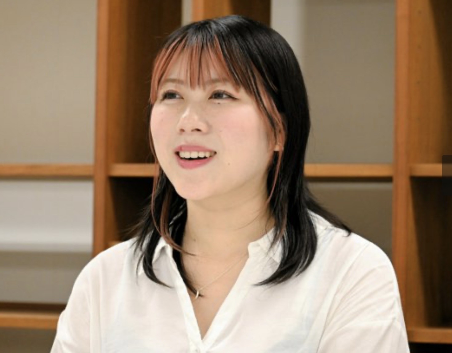 Miki Nishitani smiling brightly