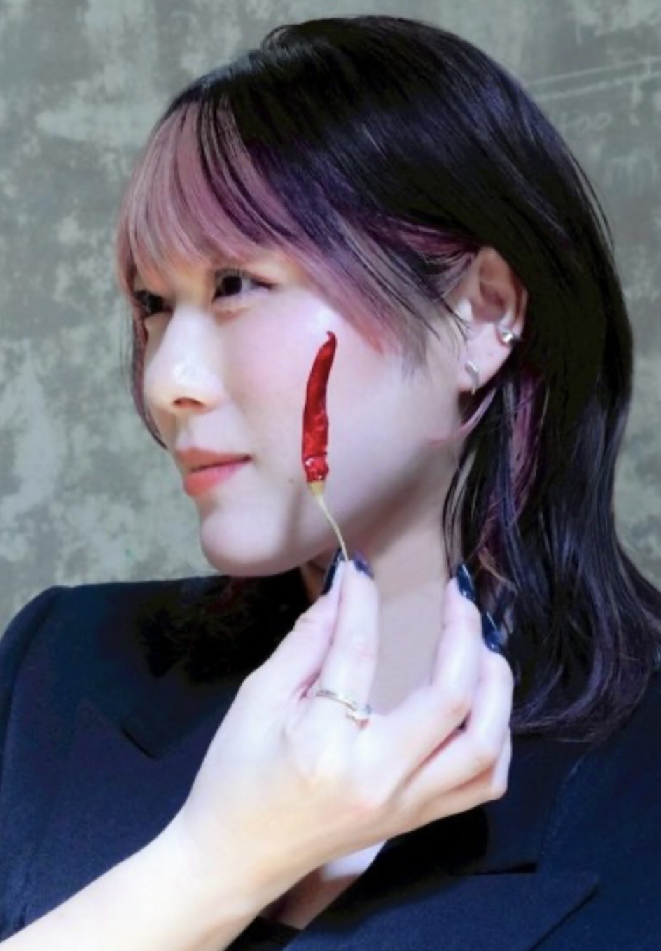 Miki's chili-themed nails