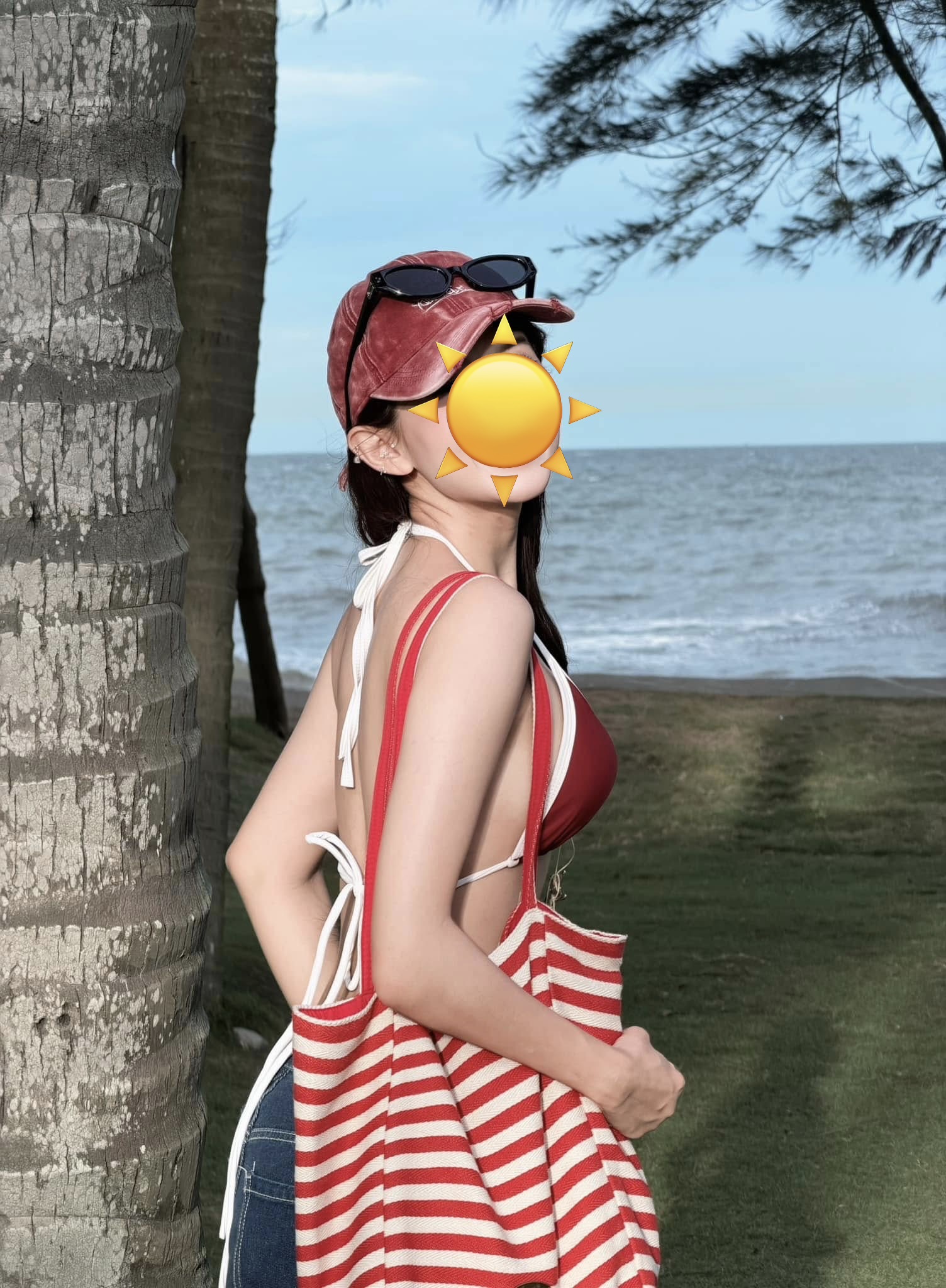 The Hidden Pain Behind Stunning Summer Beach Photos 1 Woman posing in bikini on the beach