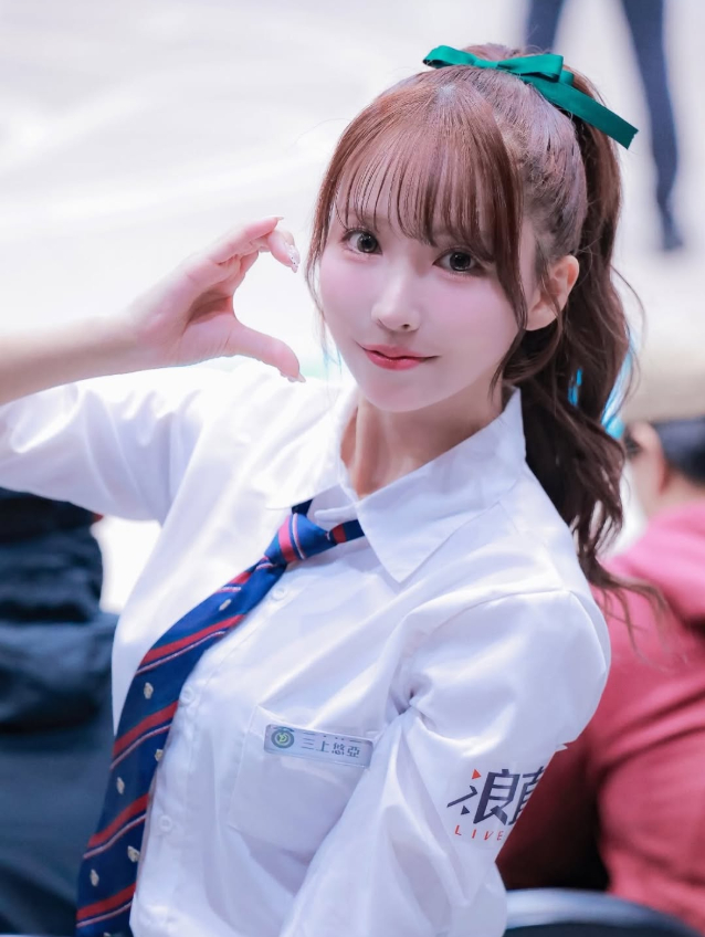 Yua Mikami smiling on basketball court