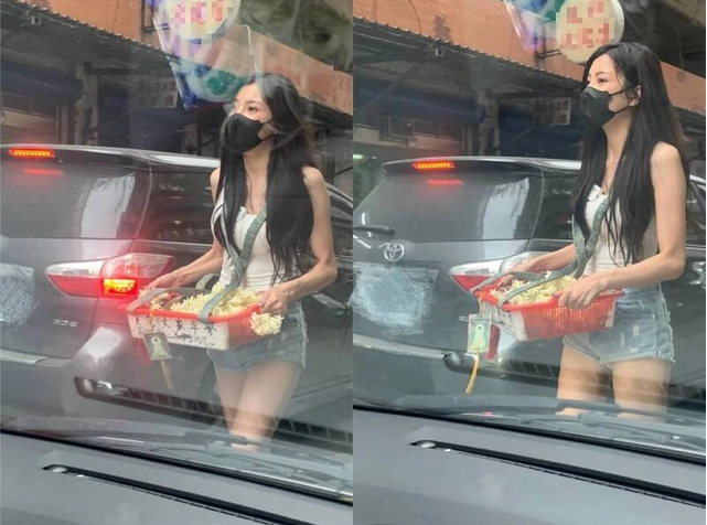 Young woman in white tank top and shorts selling flowers
