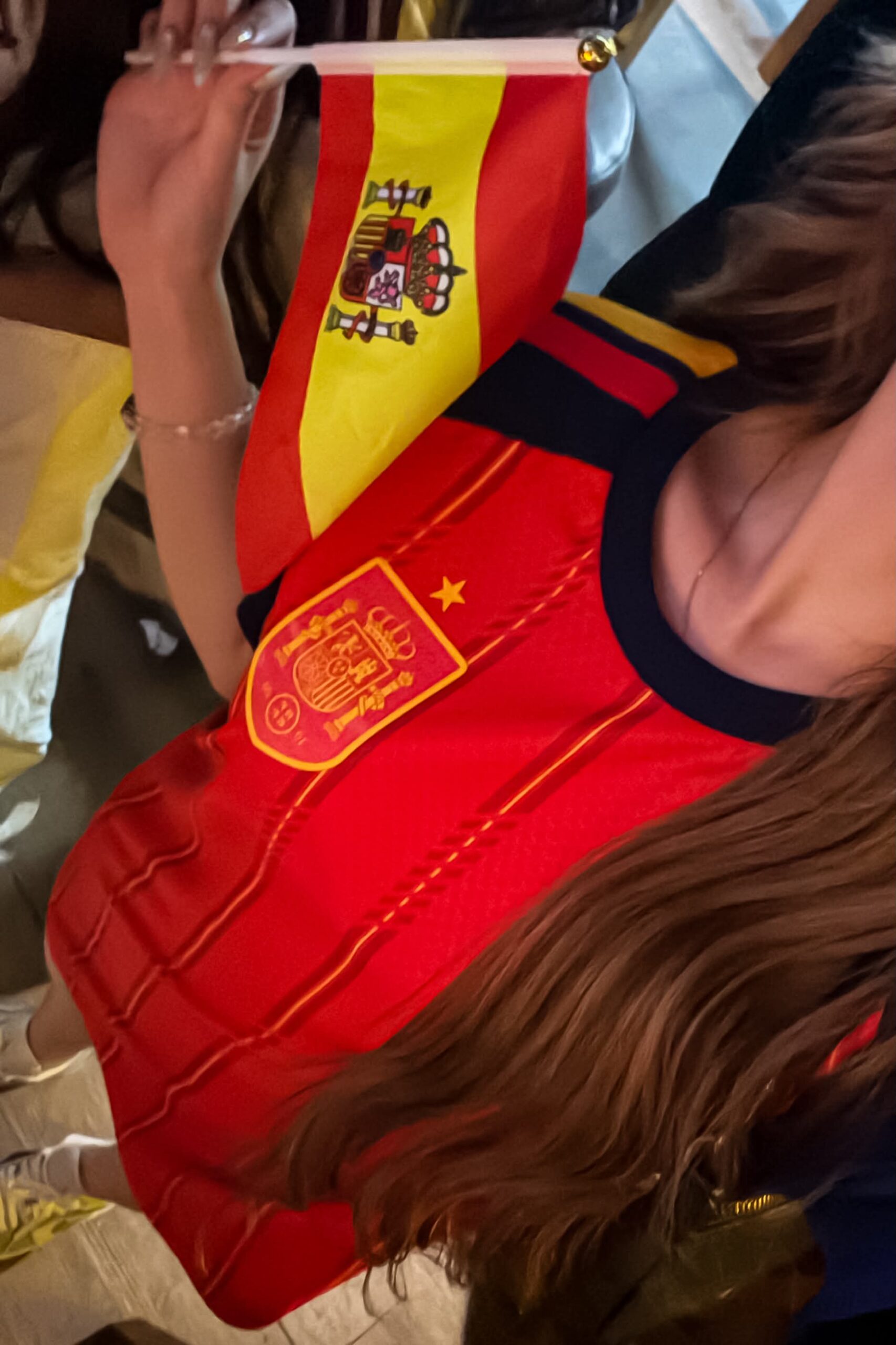 Spanish Football Fan Steals the Spotlight with Sweet Look 4 Happy Spanish football fan enjoying the game