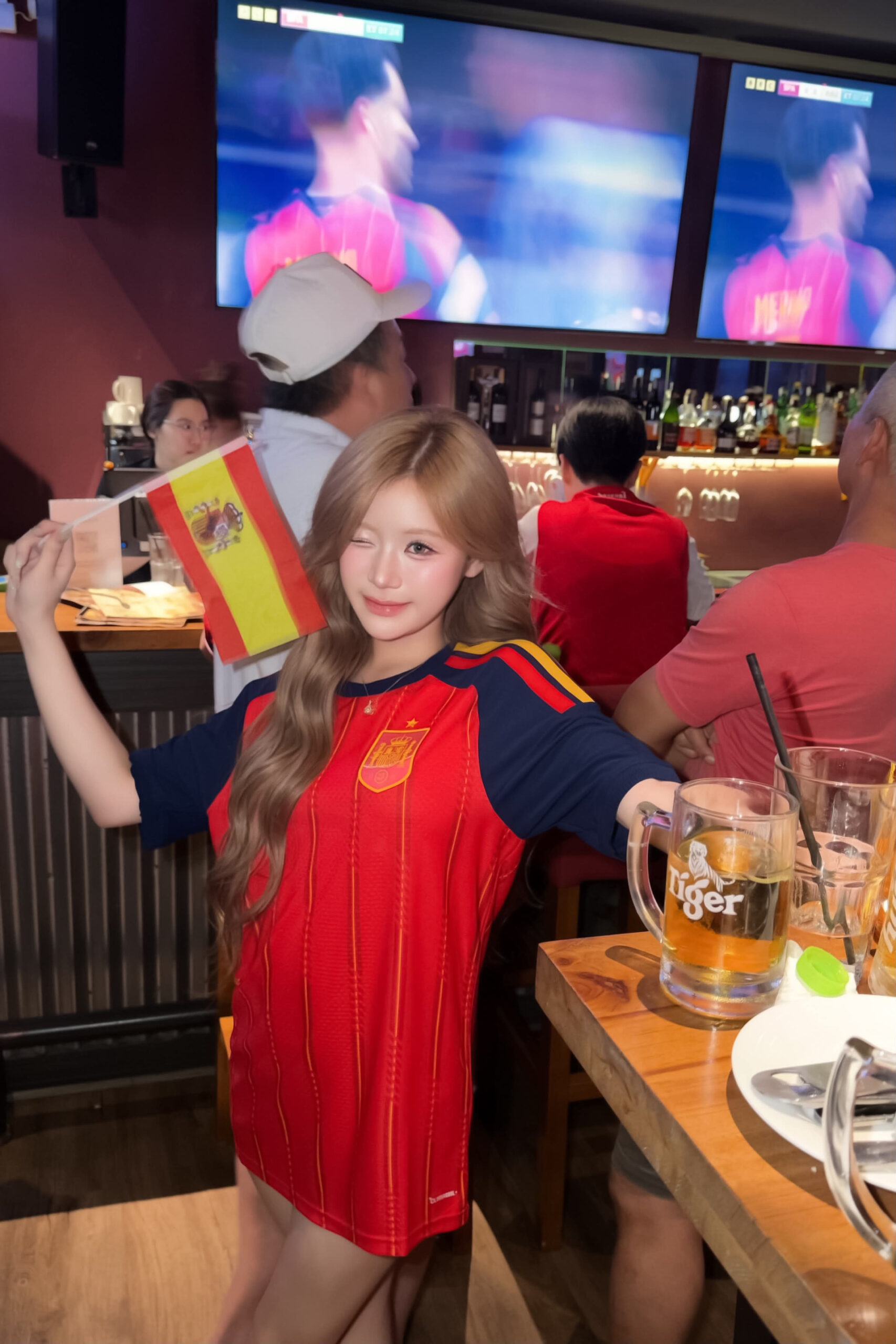 Spanish Football Fan Steals the Spotlight with Sweet Look 2 Close-up of Spanish fan's jersey details