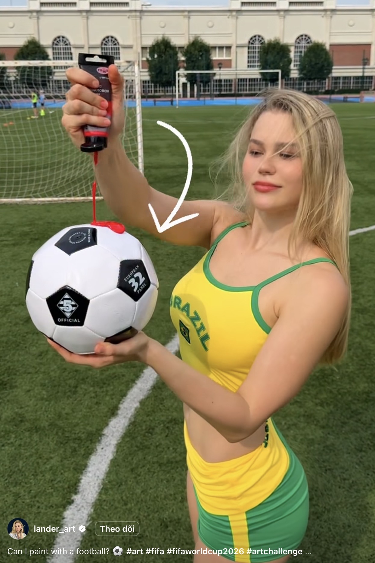 Artist Lander_art Paints Ronaldo Portrait Using a Soccer Ball 1 Lander_art in Brazil outfit ready to paint with a soccer ball
