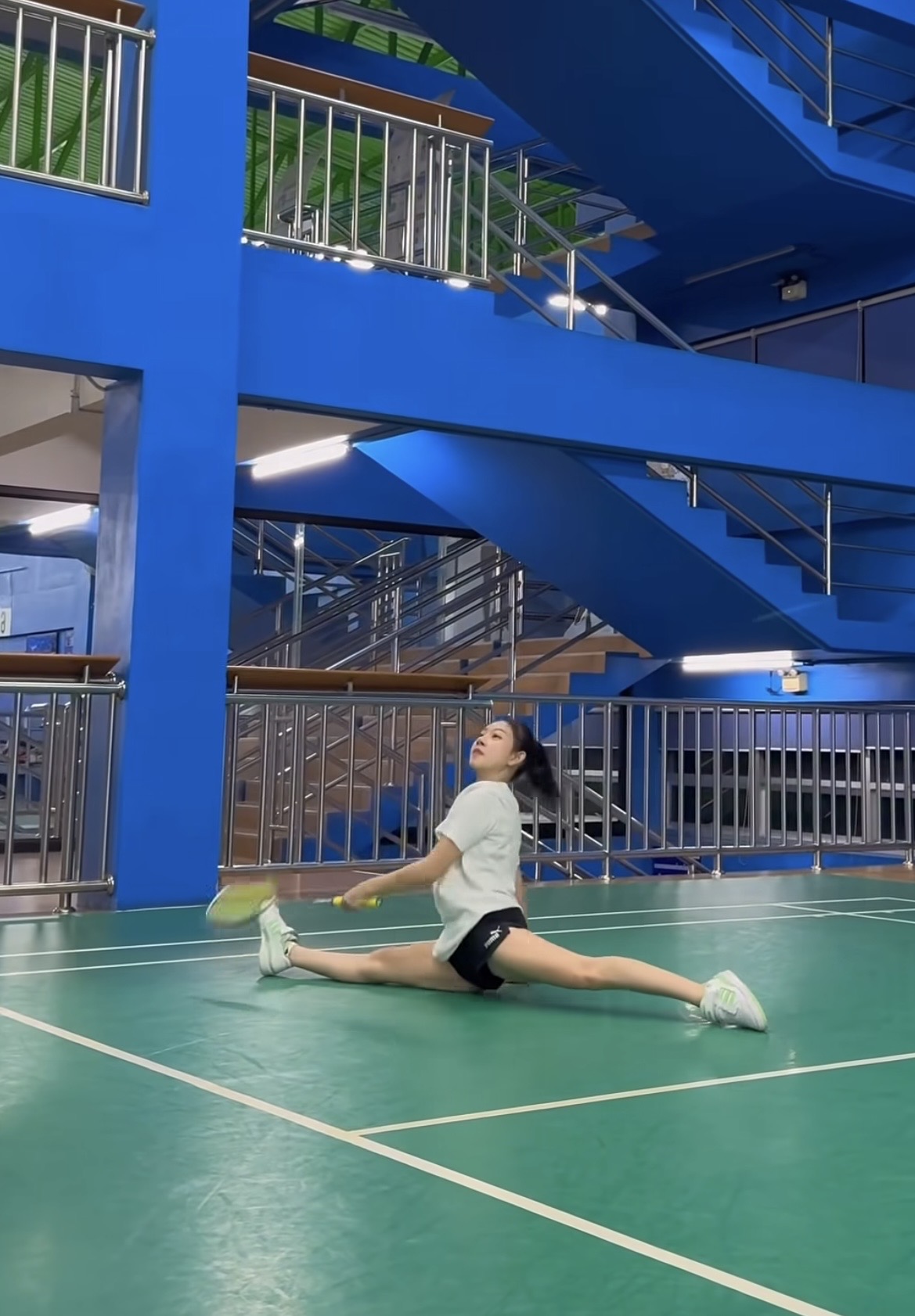 Side split on badminton court