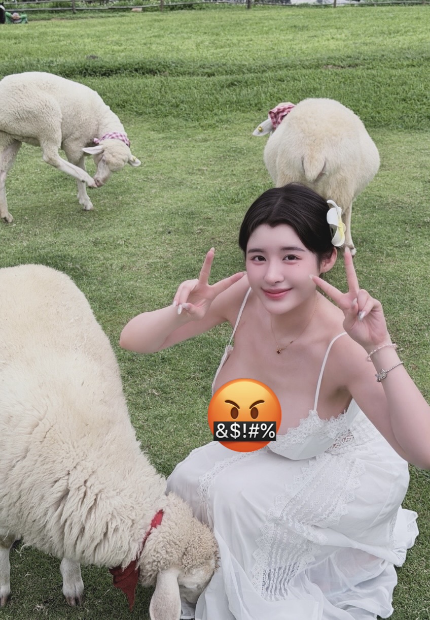 Cosplayer Sparks Debate with Bold Outfit at Sheep Farm 2 Cosplayer cocopie.cos posing in revealing dress