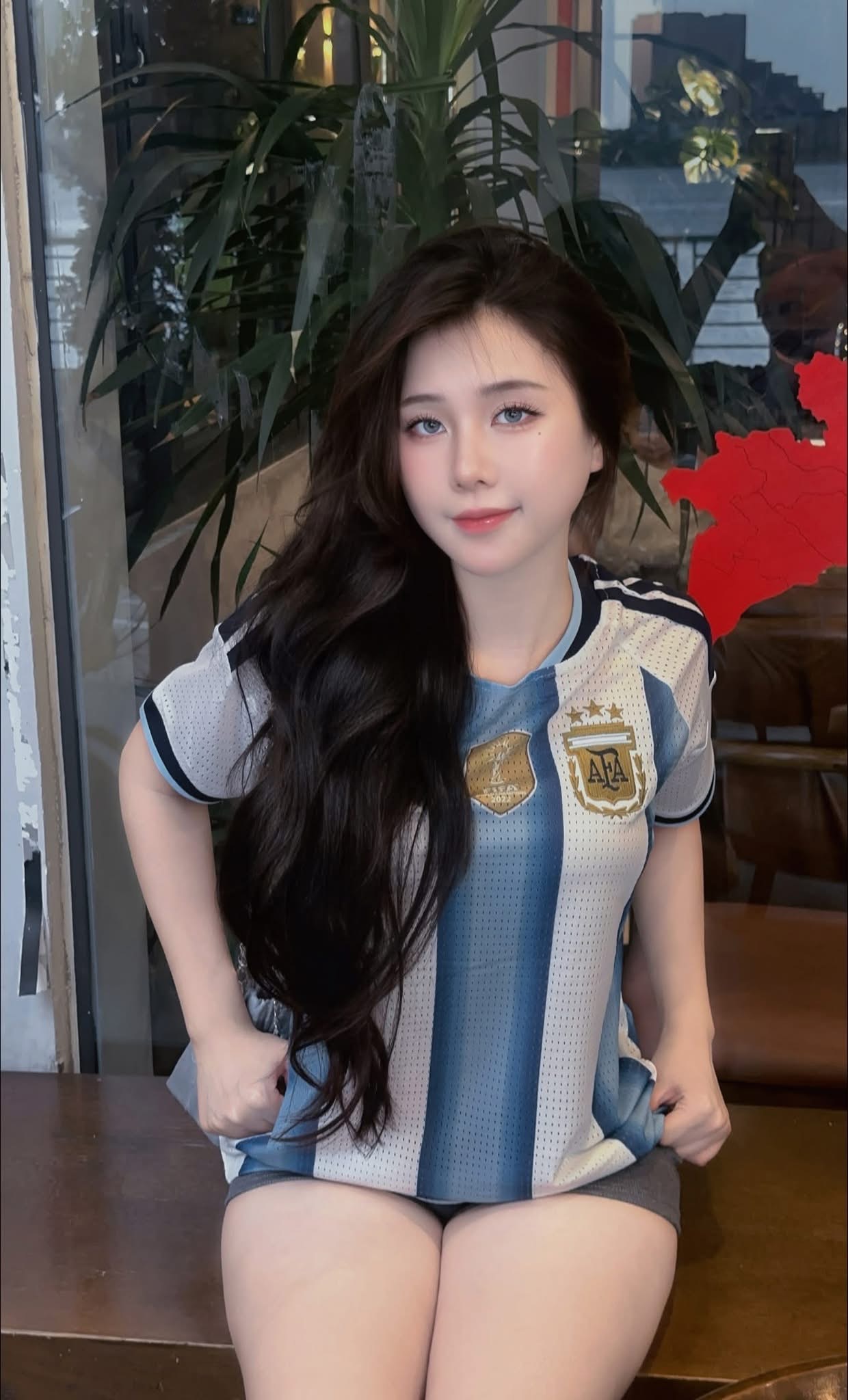 Actress from 'The Chairman' Rocks Argentina Jersey as a Casual Fan 3 Actress posing in casual football outfit