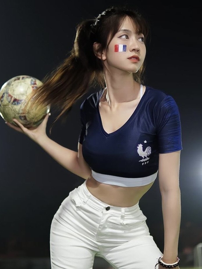 Fan girl in football jersey