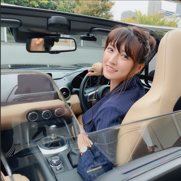 Meet Yoshikawa Aimi, Japan’s Stunning Driving Instructor with a Surprising Past 6 Yoshikawa Aimi smiling outdoors